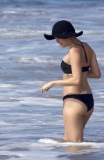 MILEY CYRUS in Bikini and Patrick Schwarzenegger on the Beach in Hawaii 2101