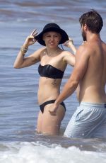MILEY CYRUS in Bikini and Patrick Schwarzenegger on the Beach in Hawaii 2101