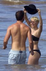 MILEY CYRUS in Bikini and Patrick Schwarzenegger on the Beach in Hawaii 2101