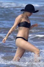 MILEY CYRUS in Bikini and Patrick Schwarzenegger on the Beach in Hawaii 2101