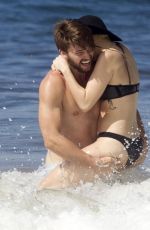 MILEY CYRUS in Bikini and Patrick Schwarzenegger on the Beach in Hawaii 2101
