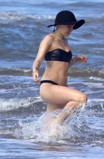 MILEY CYRUS in Bikini and Patrick Schwarzenegger on the Beach in Hawaii 2101