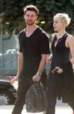 MILEY CYRUS in Tight Jumpsuit Out in Sherman Oaks