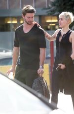 MILEY CYRUS in Tight Jumpsuit Out in Sherman Oaks
