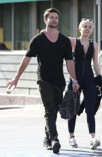 MILEY CYRUS in Tight Jumpsuit Out in Sherman Oaks