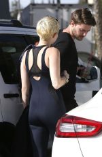 MILEY CYRUS in Tight Jumpsuit Out in Sherman Oaks