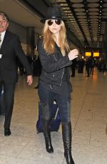 NATALIE DORMER Arrives at Heathrow Airport in London