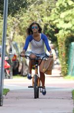 NINA AGDAL Rides Her Bike in Miami