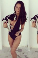 OLIVIA MUNN with Her Dog on Instagram