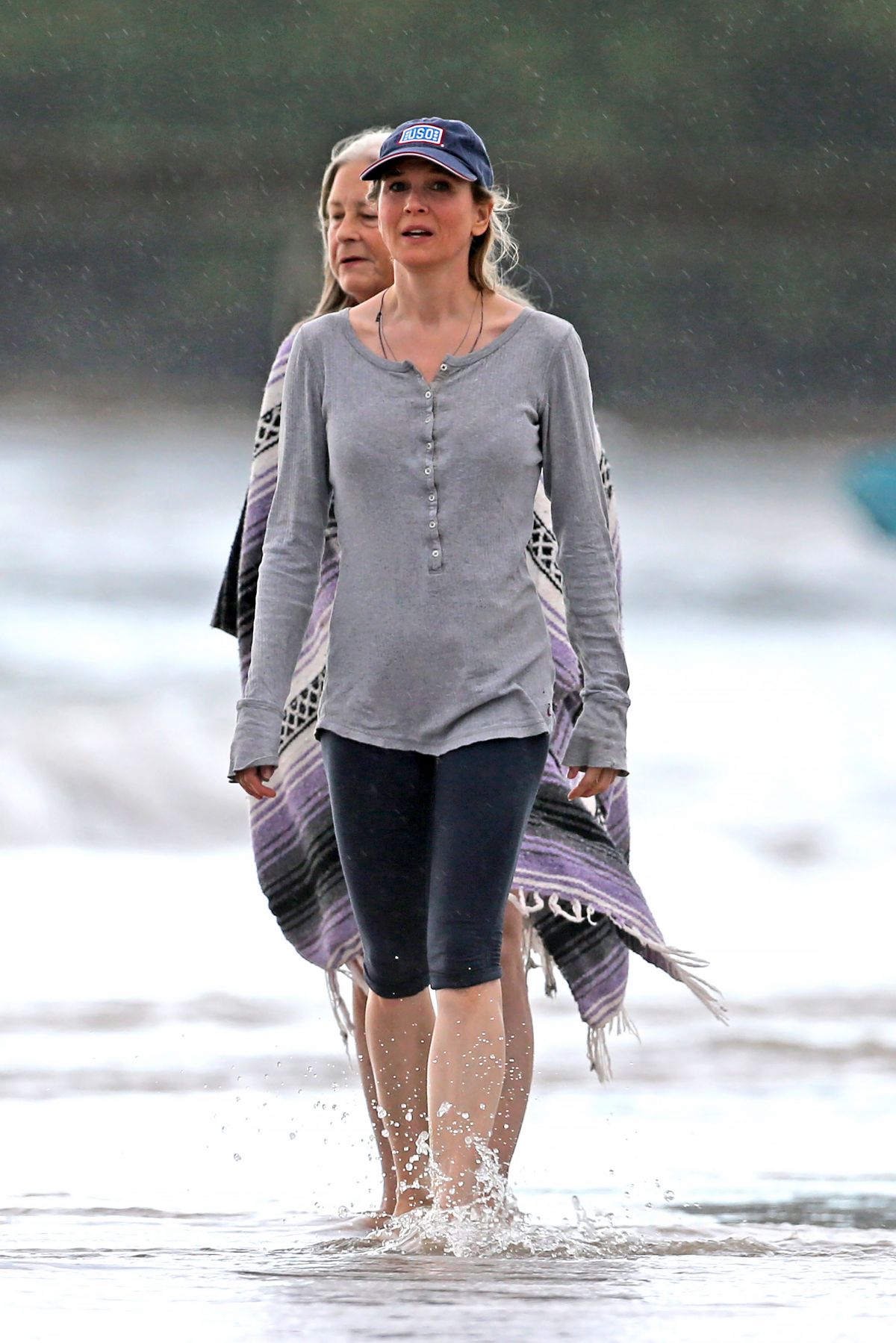 RENE ZELLWEGER in Leggings at a Beach in Hawaii.
