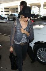 SIENNA MILLER at Los Angeles International Airport 0901