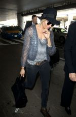 SIENNA MILLER at Los Angeles International Airport 0901