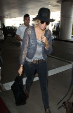 SIENNA MILLER at Los Angeles International Airport 0901