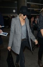 SIENNA MILLER at Los Angeles International Airport 0901