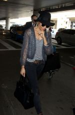 SIENNA MILLER at Los Angeles International Airport 0901