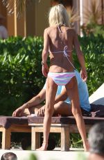 TARA REID in Bikini at a Pool in Hawaii