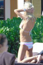 TARA REID in Bikini at a Pool in Hawaii