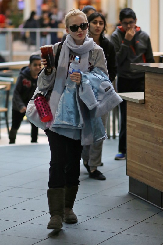 DOVE CAMERON Arrives at Vancouver Airport