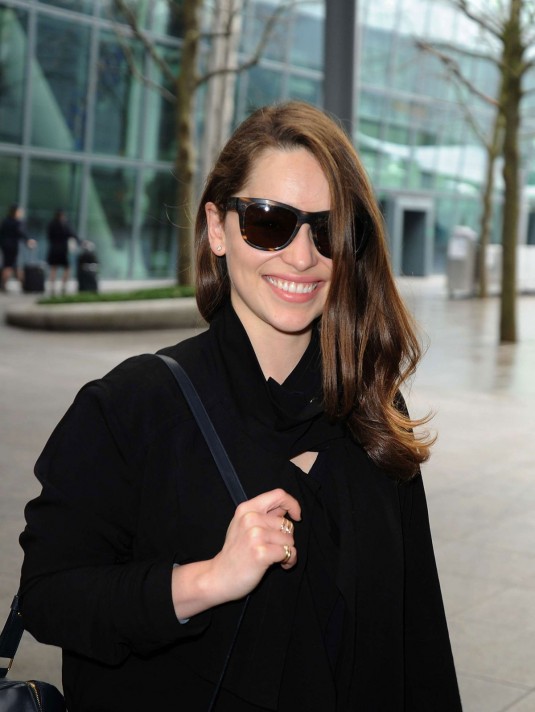 EMILIA CLARKE at Heathrow Airport