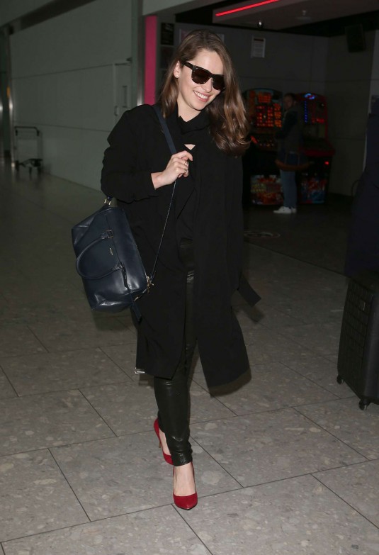 EMILIA CLARKE at Heathrow Airport
