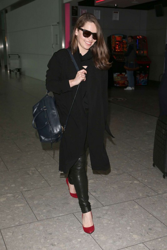 EMILIA CLARKE at Heathrow Airport