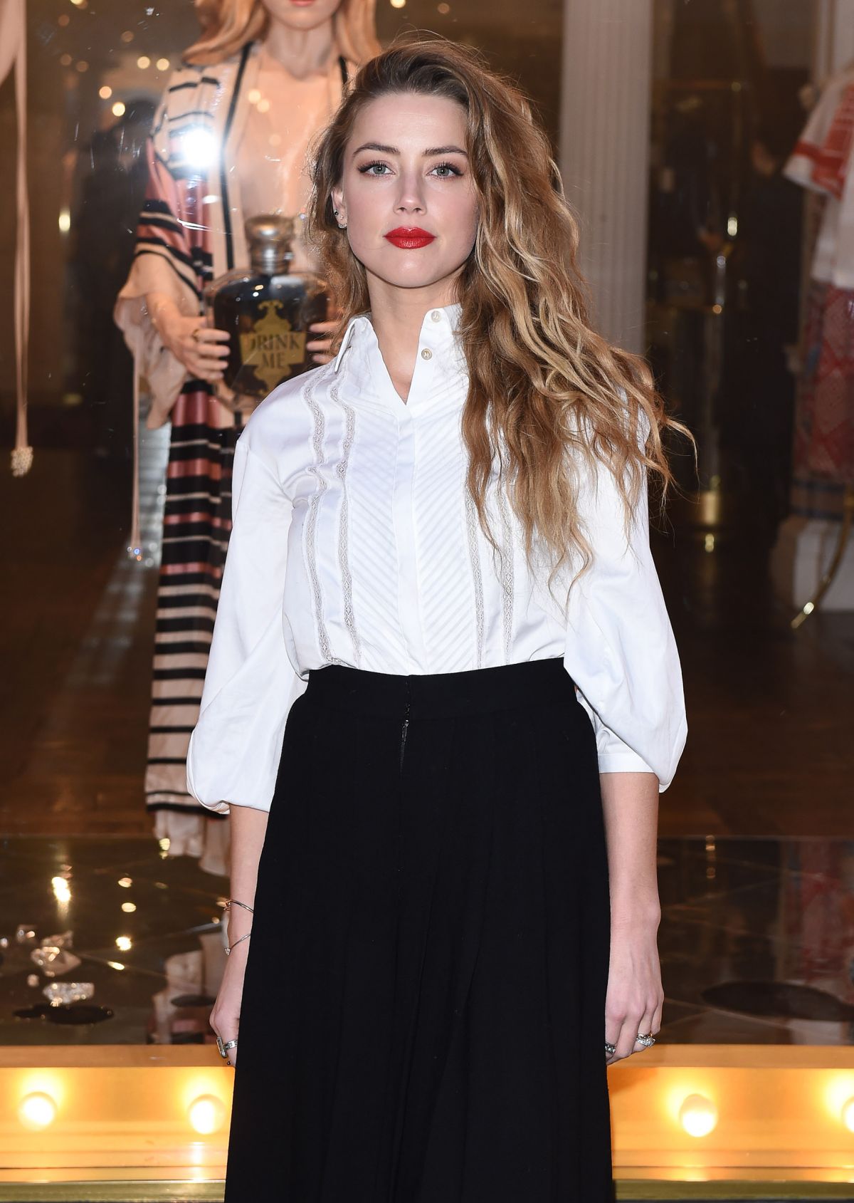 AMBER HEARD Unveils Alice in Wonderland Themed Window in London AMBER HEARD Unveils Alice in Wonderland Themed Window in London