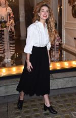 AMBER HEARD Unveils Alice in Wonderland Themed Window in London