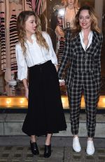 AMBER HEARD Unveils Alice in Wonderland Themed Window in London