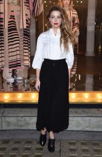 AMBER HEARD Unveils Alice in Wonderland Themed Window in London