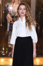 AMBER HEARD Unveils Alice in Wonderland Themed Window in London