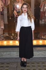 AMBER HEARD Unveils Alice in Wonderland Themed Window in London