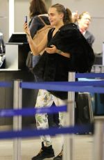 CARA DELEVINGNE at Los Angeles International Airport 0502