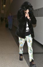CARA DELEVINGNE at Los Angeles International Airport 0502