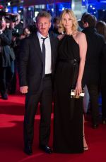 CHARLIZE THERON at The Gunman Premiere in London
