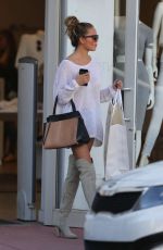 CHRISSY TEIGEN Out Shopping in Miami 2302