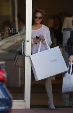 CHRISSY TEIGEN Out Shopping in Miami 2302
