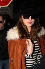 DAKOTA JOHNSON at Tegel Airport in Berlin