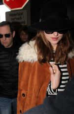 DAKOTA JOHNSON at Tegel Airport in Berlin