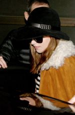 DAKOTA JOHNSON at Tegel Airport in Berlin