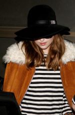 DAKOTA JOHNSON at Tegel Airport in Berlin