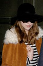 DAKOTA JOHNSON at Tegel Airport in Berlin