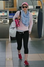 DOVE CAMOERON in Leggings at Ariport in Vancouver