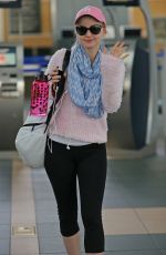 DOVE CAMOERON in Leggings at Ariport in Vancouver