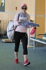 DOVE CAMOERON in Leggings at Ariport in Vancouver
