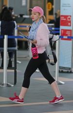DOVE CAMOERON in Leggings at Ariport in Vancouver
