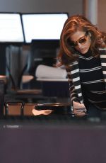 EVA MENDES Arrives at JFK Airport in New York 2002