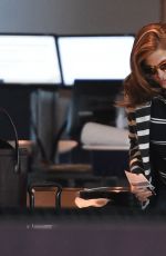 EVA MENDES Arrives at JFK Airport in New York 2002