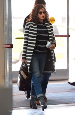 EVA MENDES Arrives at JFK Airport in New York 2002