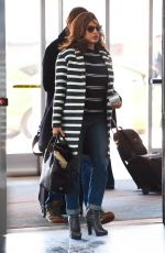 EVA MENDES Arrives at JFK Airport in New York 2002