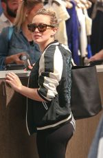 HILARY DUFF Shoping at Intermix in Los Angeles